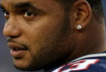 FOXBORO, MA - SEPTEMBER 03:  Richard Seymour #93 of the New England Patriots looks on before the game against the New York Giants on September 3, 2009 at Gillette Stadium in Foxboro, Massachusetts.  (Photo by Elsa/Getty Images)