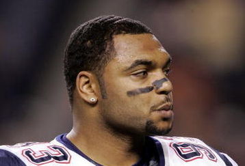 DENVER - JANUARY 14:  Richard Seymour #93 of the New England Patriots stands on the field before a game against the Denver Broncos during the AFC Divisional Playoff game on January 14, 2006 at Invesco Field at Mile High in Denver, Colorado.  (Photo by Brian Bahr/Getty Images)