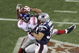 GLENDALE, AZ - FEBRUARY 03:  David Tyree #85 of the New York Giants catches a 32-yard pass from Eli Manning #10 as Rodney Harrison #37 of the New England Patriots attempts to knock it out in the fourth quarter of Super Bowl XLII on February 3, 2008 at the University of Phoenix Stadium in Glendale, Arizona. The Giants defeated the Patriots 17-14.  (Photo by Doug Pensinger/Getty Images)