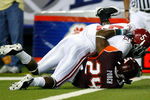 ATLANTA - SEPTEMBER 05:  Running back Roy Upchurch #5 of the Alabama Crimson Tide is tackled as he scores a touchdown over Dorian Porch #24 of the Virginia Tech Hokies during the Chick-fil-A Kickoff Game at Georgia Dome on September 5, 2009 in Atlanta, Georgia.  (Photo by Kevin C. Cox/Getty Images)