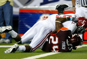 ATLANTA - SEPTEMBER 05:  Running back Roy Upchurch #5 of the Alabama Crimson Tide is tackled as he scores a touchdown over Dorian Porch #24 of the Virginia Tech Hokies during the Chick-fil-A Kickoff Game at Georgia Dome on September 5, 2009 in Atlanta, Georgia.  (Photo by Kevin C. Cox/Getty Images)