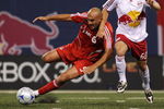 EAST RUTHERFORD, NJ - OCTOBER 04:  Danny Dichio #9 of the Toronto FC and Jeff Parke # 60 of the New York Red Bulls battle for the ball at Giants Stadium in the Meadowlands on October 4, 2008 in East Rutherford, New Jersey. Toronto defeated New York 3-1.  (Photo by Mike Stobe/Getty Images for New York Red Bulls)