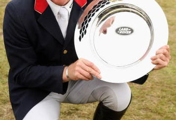 STAMFORD, ENGLAND - SEPTEMBER 06:  Oliver Townend of Great Britain poses with the trophy after winning the Land Rover Burghley Horse Trials on September 6, 2009 in Stamford, United Kingdom.  (Photo by Warren Little/Getty Images)