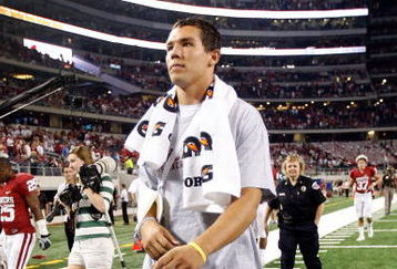 ARLINGTON, TX - SEPTEMBER 05:  Quarterback Sam Bradford #14 of the Oklahoma Sooners walks off the field after a 14-13 loss against the Brigham Young Cougars at Cowboys Stadium on September 5, 2009 in Arlington, Texas.  Bradford suffered an injury in the second quarter and did not return to the game.  (Photo by Ronald Martinez/Getty Images)