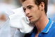 NEW YORK - SEPTEMBER 08: Andy Murray of Great Britain wipes his face during his match against Marin Cilic of Croatia during day nine of the 2009 U.S. Open at the USTA Billie Jean King National Tennis Center on September 8, 2009 in the Flushing neighborhood of the Queens borough of New York City. (Photo by Nick Laham/Getty Images)