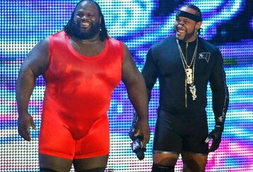 LAS VEGAS - AUGUST 24:  Wrestlers Mark Henry (L) and MVP are introduced during the WWE Monday Night Raw show at the Thomas & Mack Center August 24, 2009 in Las Vegas, Nevada.  (Photo by Ethan Miller/Getty Images)