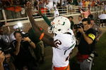 TALLAHASSEE, FL - SEPTEMBER 07:  Quarterback Jacory Harris #12 of the Miami Hurricanes celebrates victory over the Florida State Seminoles as he leaves the field at Doak Campbell Stadium on September 7, 2009 in Tallahassee, Florida. Miami defeated Florida State 38-34.  (Photo by Doug Benc/Getty Images)
