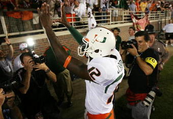TALLAHASSEE, FL - SEPTEMBER 07:  Quarterback Jacory Harris #12 of the Miami Hurricanes celebrates victory over the Florida State Seminoles as he leaves the field at Doak Campbell Stadium on September 7, 2009 in Tallahassee, Florida. Miami defeated Florida State 38-34.  (Photo by Doug Benc/Getty Images)
