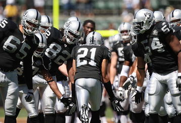 OAKLAND, CA - AUGUST 29:  Nnamdi Asomugha #21 of the Oakland Raiders is introduced against the New Orleans Saints during an NFL preseason game at Oakland-Alameda County Coliseum on August 29, 2009 in Oakland, California.  (Photo by Jed Jacobsohn/Getty Images)