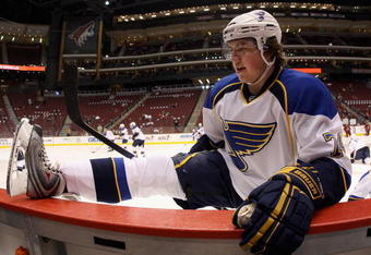 GLENDALE, AZ - APRIL 07:  T.J. Oshie #74 of the St. Louis Blues stretches  before a NHL game against the Phoenix Coyotes at Jobing.com Arena on April 7, 2009 in Glendale, Arizona.  (Photo by Christian Petersen/Getty Images)