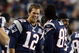 FOXBORO, MA - SEPTEMBER 03:  Tom Brady #12 of the New England Patriots and Randy Moss #81 celebrate in the fourth quarter against the New York Giants on September 3, 2009 at Gillette Stadium in Foxboro, Massachusetts. The Patriots defeated the Giants 38-27.  (Photo by Elsa/Getty Images)