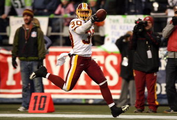 SEATTLE - JANUARY 05:  Safety LaRon Landry #30 of the Washington Redskins celebrates after intercepting a pass in the fourth quarter against the Seattle Seahawks during the NFC Wild Card game at Qwest Field on January 5, 2008 in Seattle, Washington.  (Photo by Otto Greule Jr/Getty Images)