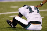 INDIANAPOLIS, IN - AUGUST 20: Quarterback A.J. Feeley #14 of the Philadelphia Eagles sits injured on the field against the Indianapolis Colts at Lucas Oil Stadium on August 20, 2009 in Indianapolis, Indiana. (Photo by Scott Boehm/Getty Images)