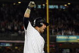 NEW YORK - SEPTEMBER 08:  Nick Swisher #33 of the New York Yankees reacts to his game-winning home run against the Tampa Bay Rays on September 8, 2009 at Yankee Stadium in the Bronx borough of New York City. The Yankees won the game 3-2.  (Photo by Jim McIsaac/Getty Images)