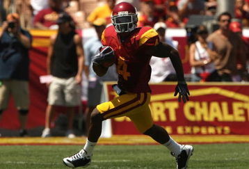 LOS ANGELES, CA - SEPTEMBER 05:  Running back Joe McKnight #4 of  the USC Trojans carries the ball against the San Jose State Spartans on September 5, 2009 at the Los Angeles Coliseum in Los Angeles, California. USC won 56-3.  (Photo by Stephen Dunn/Getty Images)
