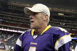 HOUSTON - AUGUST 31:  Quarterback Brett Favre #4 of the Minnesota Vikings leaves the field after leading the Vikings to a 17-10 win over the Houston Texans at Reliant Stadium on August 31, 2009 in Houston, Texas.  (Photo by Bob Levey/Getty Images)