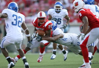 LOUISVILLE, KY - AUGUST 31:  Victor Anderson #20 of the Louisville Cardinals runs with the ball during the game against the Kentucky Wildcats at Papa John's Cardinal Stadium on August 31, 2008 in Louisville, Kentucky. (Photo by Andy Lyons/Getty Images) 