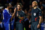 LONDON, ENGLAND - MAY 06:  Frank Lampard of Chelsea argues with referee Tom Henning Ovrebo during the UEFA Champions League Semi Final Second Leg match between Chelsea and Barcelona at Stamford Bridge on May 6, 2009 in London, England.  (Photo by Clive Rose/Getty Images)