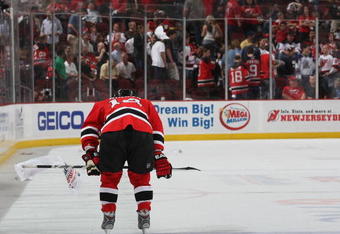 NEWARK, NJ - APRIL 28: A dejected Brian Gionta #14 of the New Jersey Devils leaves the ice after losing to the Carolina Hurricanes in Game Seven of the Eastern Conference Semifinal Round of the 2009 Stanley Cup Playoffs at the Prudential Center on April 28, 2009 in Newark, New Jersey. The Hurricanes defetaed the Devils 4-3. (Photo by Bruce Bennett/Getty Images)