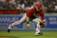 LOS ANGELES, CA - MAY 05:  Second baseman Augie Ojeda #11 of the Arizona Diamondbacks fields against the Los Angeles Dodgers at Dodger Stadium on May 5, 2009 in Los Angeles, California.  (Photo by Jeff Gross/Getty Images)