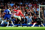 LONDON - APRIL 26:  Wayne rooney of Manchester United (10) shoots past Petr Cech of Chelsea to score their first gosl during the Barclays Premier League match between Chelsea and Manchester United at Stamford Bridge on April 26, 2008 in London, England.  (Photo by Shaun Botterill/Getty Images)