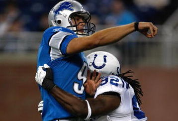 DETROIT, MI - AUGUST 28: Quarterback Matthew Stafford #9 of the Detroit Lions is tackled by defensive end Marcus Howard #92 of the Indianapolis Colts at Ford Field on August 28, 2009 in Detroit, Michigan.  (Photo by Scott Boehm/Getty Images)