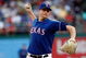 ARLINGTON, TX - JULY 29:  Pitcher Scott Feldman #39 of the Texas Rangers throws against the Detroit Tigers on July 29, 2009 at Rangers Ballpark in Arlington, Texas.  (Photo by Ronald Martinez/Getty Images)