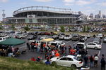 DENVER - SEPTEMBER 14:  The parking lots start to fill and fans tailgate prior to the game as the San Diego Chargers face the Denver Broncos during NFL action at Invesco Field at Mile High on September 14, 2008 in Denver, Colorado.  (Photo by Doug Pensinger/Getty Images)