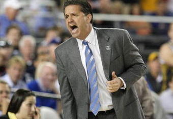 GLENDALE, AZ - MARCH 26:  Head Coach John Calipari of the Memphis Tigers adjusts his team against the Missouri Tigers in the Sweet 16 of the NCAA Division I Men's Basketball Tournament at the University of Phoenix Stadium on March 26, 2009 in Glendale, Arizona.  (Photo by Ronald Martinez/Getty Images)