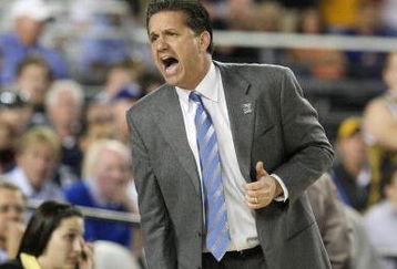 GLENDALE, AZ - MARCH 26:  Head Coach John Calipari of the Memphis Tigers adjusts his team against the Missouri Tigers in the Sweet 16 of the NCAA Division I Men's Basketball Tournament at the University of Phoenix Stadium on March 26, 2009 in Glendale, Arizona.  (Photo by Ronald Martinez/Getty Images)