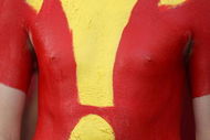 LOS ANGELES - SEPTEMBER 22:  A USC Trojans fan is painted in USC colors during the game with the Washington State Cougars on September 22, 2007 at the Los Angeles Coliseum in Los Angeles, California.  USC won 47-14. (Photo by Stephen Dunn/Getty Images)