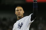NEW YORK - SEPTEMBER 09:  Derek Jeter #2 of the New York Yankees acknowledges the crowd after hitting a single in the 7th inning against the Tampa Bay Rays during the game on September 9, 2009 at Yankee Stadium in the Bronx borough of New York City. Jeter's hit ties Lou Gehrig's all-time club record of 2,721 hits. (Photo by Jared Wickerham/Getty Images)