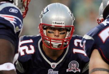 PHILADELPHIA - AUGUST 13:  Tom Brady #12 of the New England Patriots huddles with his teammates against the Philadelphia Eagles on August 13, 2009 at Lincoln Financial Field in Philadelphia, Pennsylvania.  (Photo by Jim McIsaac/Getty Images)