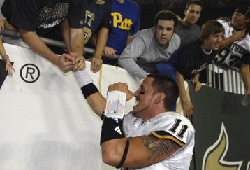 TAMPA, FL - OCTOBER 2:  Quarterback Bill Stull #11 of the Pittsburgh Panthers celebrates with fans an upset win against the University of South Florida Bulls at Raymond James Stadium on October 2, 2008 in Tampa, Florida.  (Photo by Al Messerschmidt/Getty Images)