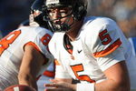 PASADENA, CA - NOVEMBER 08:   Sean Canfield #5 of the Oregon State Beavers passes off the ball during the game against the UCLA Bruins at the Pasadena Rose Bowl on November 8, 2008 in Pasadena, California.  (Photo by Lisa Blumenfeld/Getty Images)