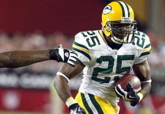 GLENDALE, AZ - AUGUST 28:  Runningback Ryan Grant #25  of the Green Bay Packers rushes with the football during the game against the Arizona Cardinals at the University of Phoenix Stadium on August 28, 2009 in Glendale, Arizona. The Packers defeated the Cardinals 44-37.  (Photo by Christian Petersen/Getty Images)