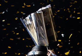 HOMESTEAD, FL - NOVEMBER 16:  Jimmie Johnson, driver of the #48 Lowe's Chevrolet, celebrates with the trophy after winning the NASCAR Sprint Cup Series Championship at Homestead-Miami Speedway on November 16, 2008 in Homestead, Florida.  (Photo by Jaime Squire/Getty Images for NASCAR)