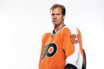PHILADELPHIA - JULY 06: (EDITORS NOTE: THIS IMAGE HAS BEEN DIGITALLY ALTERED) Chris Pronger #20 of the Philadelphia Flyers poses for a portrait after his first press conference as a Philadelphia Flyer at Flyer's Skate Zone on July 6, 2009 in Philadelphia, Pennsylvania.  (Photo by Nick Laham/Getty Images)