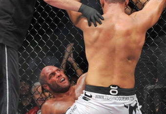 PORTLAND, OR - AUGUST 29:  UFC fighter Randy Couture (Bottom) battles UFC fighter Antonio Nogueira (Top) during their Heavyweight bout at UFC 102:  Couture vs. Nogueira at the Rose Garden Arena on August 29, 2009 in Portland, Oregon.  (Photo by Jon Kopaloff/Getty Images)