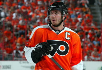 PHILADELPHIA - APRIL 25:  Mike Richards #18 of the Philadelphia Flyers skates against the Pittsburgh Penguins during Game Six of the Eastern Conference Quarterfinal Round of the 2009 NHL Stanley Cup Playoffs  at the Wachovia Center on April 25, 2009 in Philadelphia, Pennsylvania. The Penguins defeated the Flyers 5-3 to win the series 4 games to 2.  (Photo by Jim McIsaac/Getty Images)