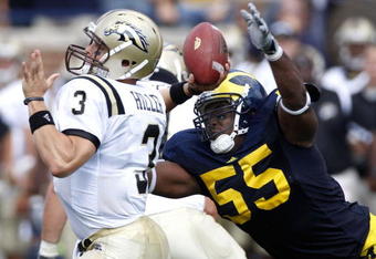ANN ARBOR, MI - SEPTEMBER 05:  Brandon Graham #55 of the Michigan Wolverines dives for a sack on Tim Hiller #3 of the Western Michigan Broncos on September 5, 2009 at Michigan Stadium in Ann Arbor, Michigan.  (Photo by Gregory Shamus/Getty Images)