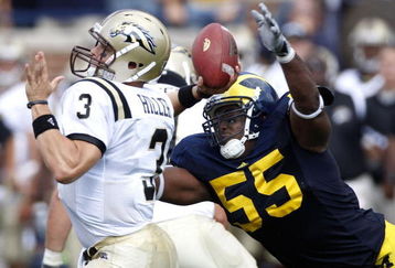 ANN ARBOR, MI - SEPTEMBER 05:  Brandon Graham #55 of the Michigan Wolverines dives for a sack on Tim Hiller #3 of the Western Michigan Broncos on September 5, 2009 at Michigan Stadium in Ann Arbor, Michigan.  (Photo by Gregory Shamus/Getty Images)
