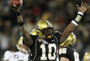 NASHVILLE, TN - DECEMBER 31:  Larry Smith #10 of the Vanderbilt Commodores celebrates against the Boston College Eagles during the Gaylord Hotels Music City Bowl at LP Field on December 31, 2008 in Nashville, Tennessee.  (Photo by Andy Lyons/Getty Images)