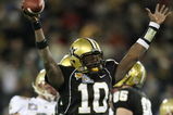 NASHVILLE, TN - DECEMBER 31:  Larry Smith #10 of the Vanderbilt Commodores celebrates against the Boston College Eagles during the Gaylord Hotels Music City Bowl at LP Field on December 31, 2008 in Nashville, Tennessee.  (Photo by Andy Lyons/Getty Images)