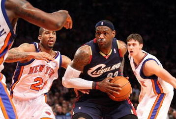 NEW YORK - FEBRUARY 04:  LeBron James #23 of the Cleveland Cavaliers drives the ball to the basket against Wilson Chandler #21 of the New York Knicks on February 4, 2009 at Madison Square Garden in New York City. NOTE TO USER: User expressly acknowledges and agrees that, by downloading and or using this photograph, User is consenting to the terms and conditions of the Getty Images License Agreement.  (Photo by Nick Laham/Getty Images)