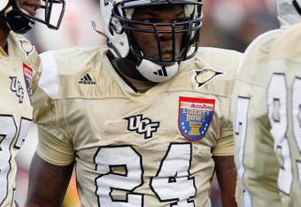 MEMPHIS, TN - DECEMBER 29: Kevin Smith #24 of the UCF Knights looks on during a break in action against the Mississippi State Bulldogs on December 29, 2007 at the Liberty Bowl Memorial Stadium in Memphis, Tennessee. The Bulldogs beat the Knights 10-3. (Photo by Joe Murphy/Getty Images)