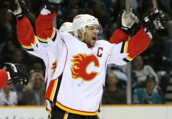 SAN JOSE, CA - APRIL 22: Jarome Iginla #12 of the Calgary Flames celebrates after scoring a goal in the first period against the San Jose Sharks during game seven of the 2008 NHL conference quarter-final series on April 22, 2008 at HP Pavilion at San Jose in San Jose, California.  (Photo by Jed Jacobsohn/Getty Images)