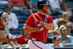 ATLANTA - AUGUST 23:  Brian McCann #16 of the Atlanta Braves hits a two-run single in the bottom of the eighth inning against the Florida Marlins on August 23, 2009 at Turner Field in Atlanta, Georgia.  (Photo by Kevin C. Cox/Getty Images)
