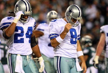PHILADELPHIA - DECEMBER 28:  Tony Romo #9 and Marion Barber #24 of the Dallas Cowboys walk to the bench after losing possesion of the ball in the second half against the Philadelphia Eagles on December 28, 2008 at Lincoln Financial Field in Philadelphia, Pennsylvania. The Eagles defeated the Cowboys 44-6.  (Photo by Jim McIsaac/Getty Images)