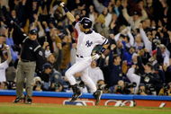 31 Oct 2001:  Derek Jeter #2 of the New York Yankees celebrates his game winning home run in the 11th inning against the Arizona Diamondbacks during game four of the Major League Baseball World Series at Yankee Stadium in New York, New York. The Yankees won 4-3. DIGITAL IMAGE. Mandatory Credit: Al Bello/ALLSPORT